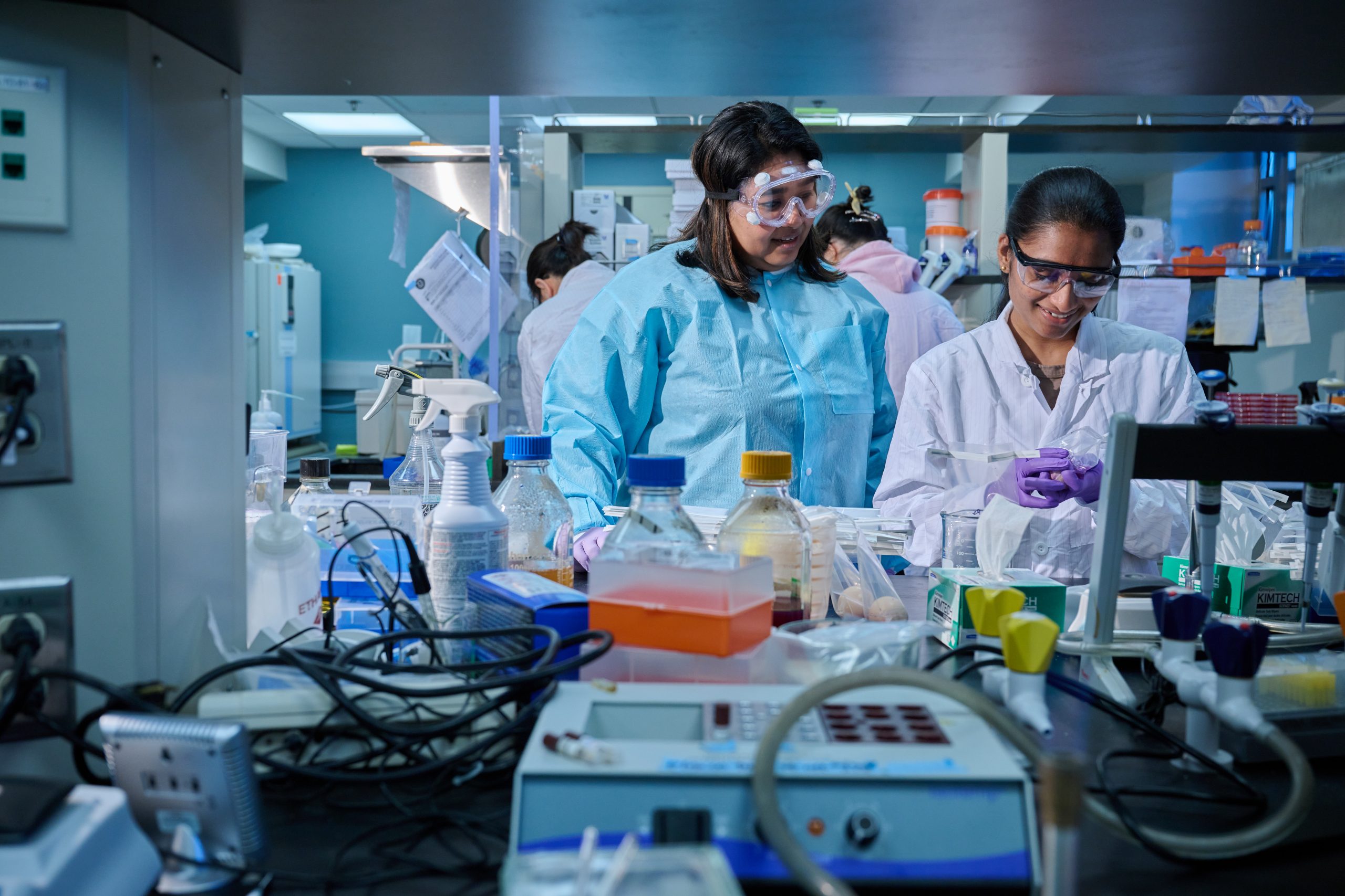 professor and grad student in a lab