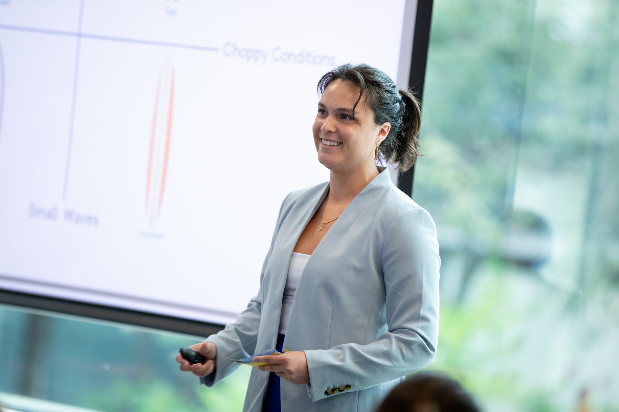 woman giving slide presentation