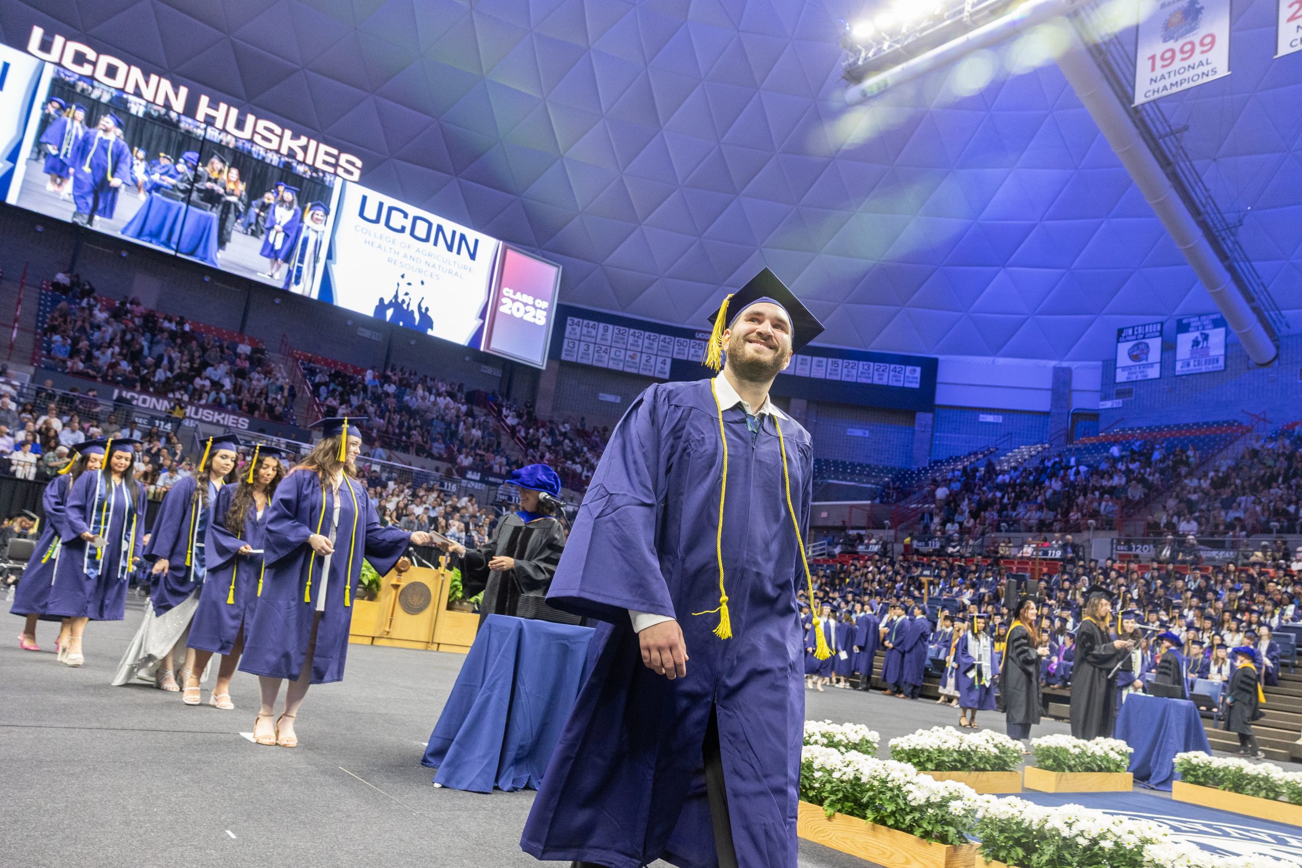 proud graduate at commencement