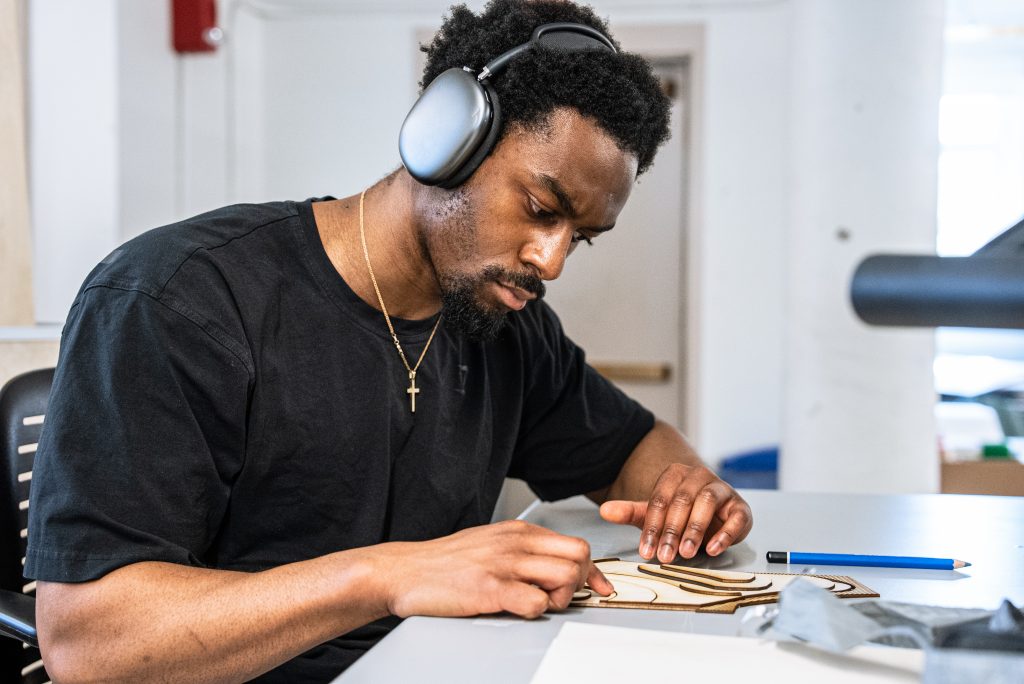 student working on a model