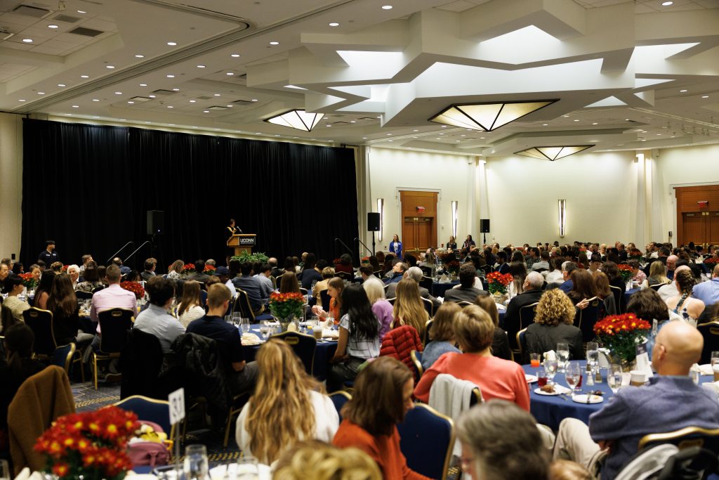 wide shot of the event space full of people